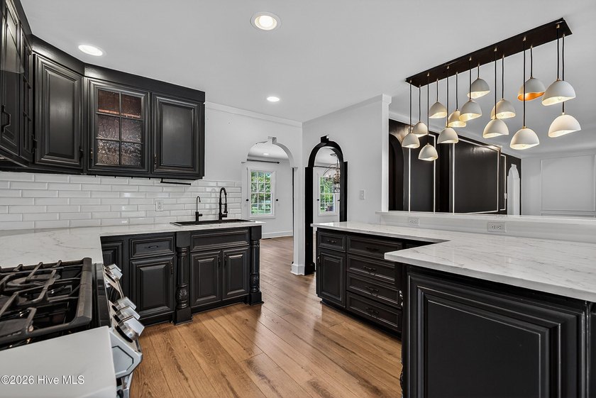 Completely reimagined and beautifully renovated, this stunning - photo 18