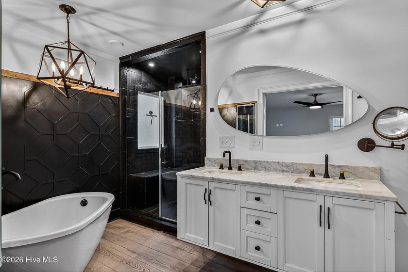 Completely reimagined and beautifully renovated, this stunning - photo 29