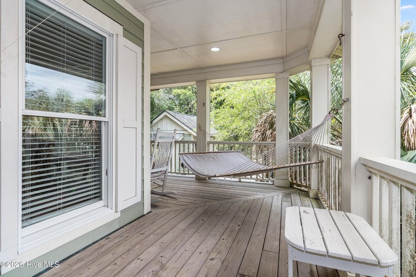 Discover this charming, well-kept secret nestled right in the - photo 6