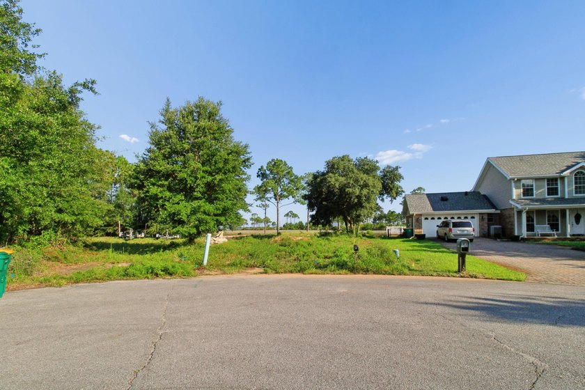 Build Your Dream Home with Stunning Water Views! This .37-acre - photo 14