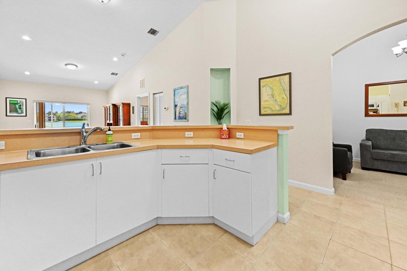 Experience serene lakefront living in this immaculately - photo 14