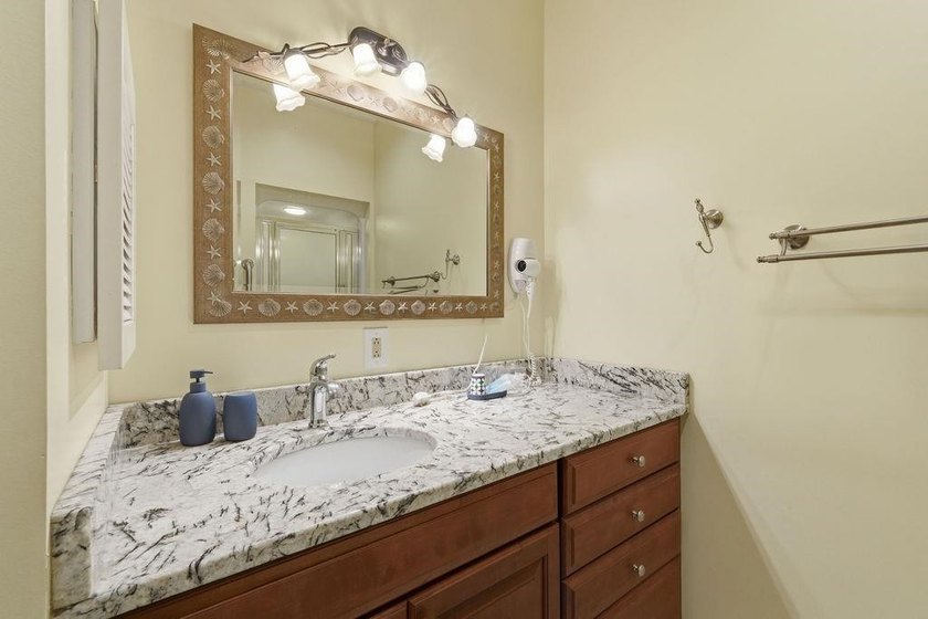 Welcome to Canterbury Court, where coastal convenience, spacious - photo 18