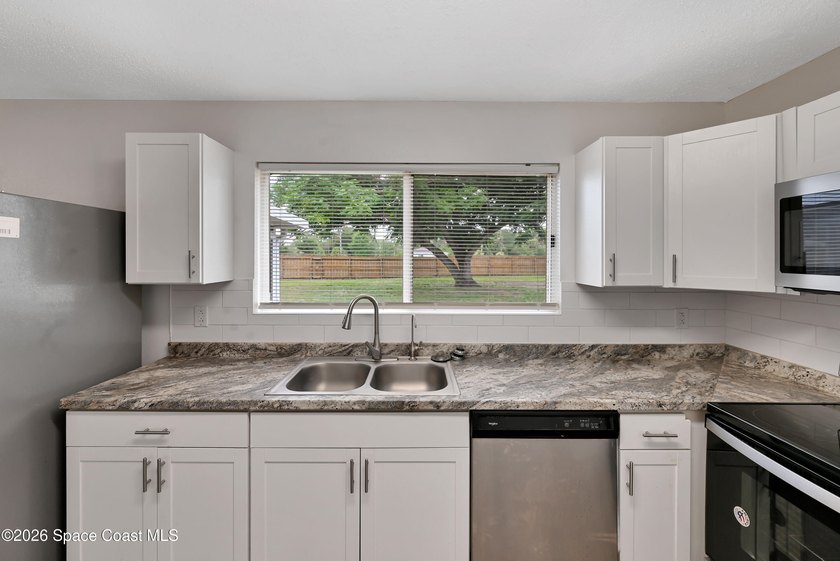 Charming home ready for its new owners! Enjoy added privacy with - photo 14