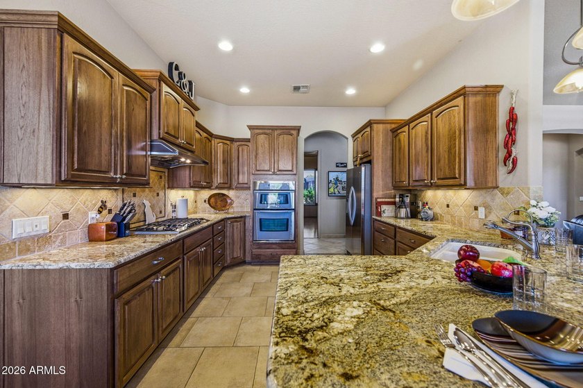 Stunning custom home in the desirable Coyote Ranch community! - photo 15