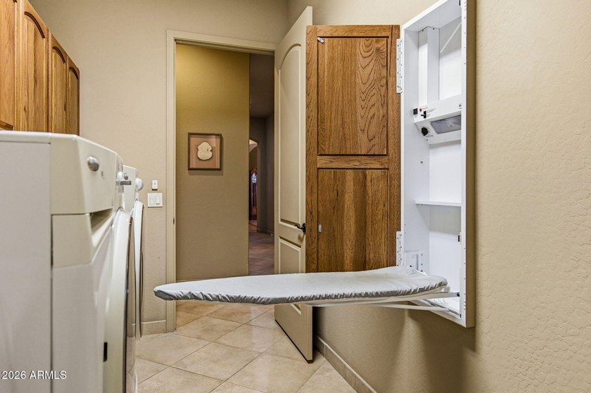 Stunning custom home in the desirable Coyote Ranch community! - photo 38