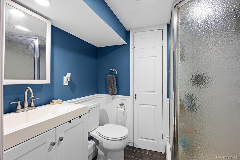 Charming four-bedroom, two bath Cape Cod located in Islip - photo 18