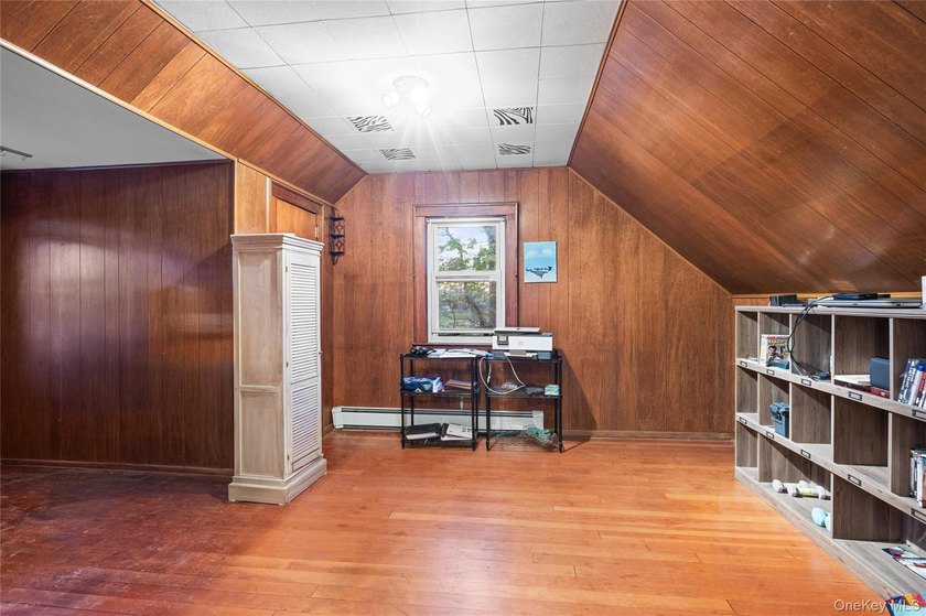 Charming four-bedroom, two bath Cape Cod located in Islip - photo 23