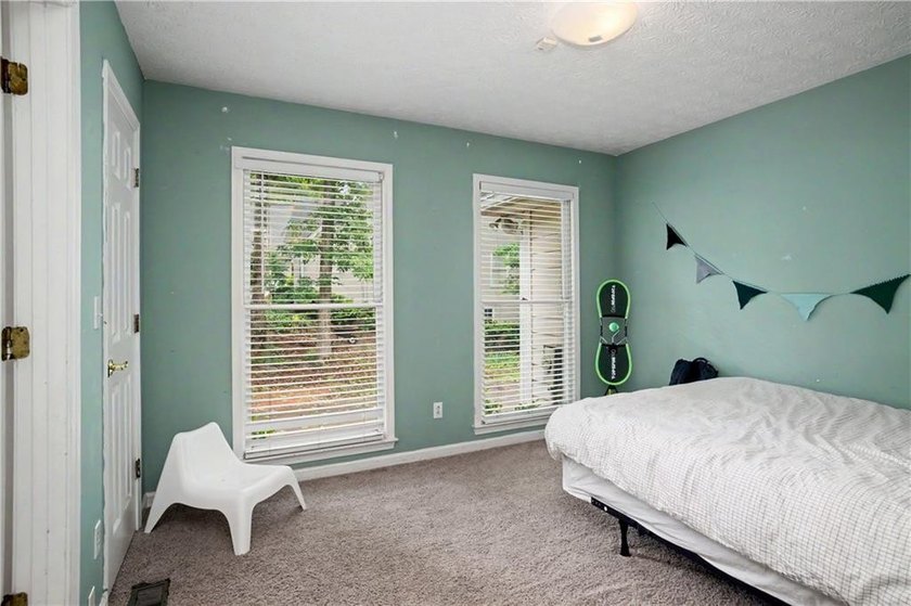 Welcome to this charming single-level home nestled in the - photo 23