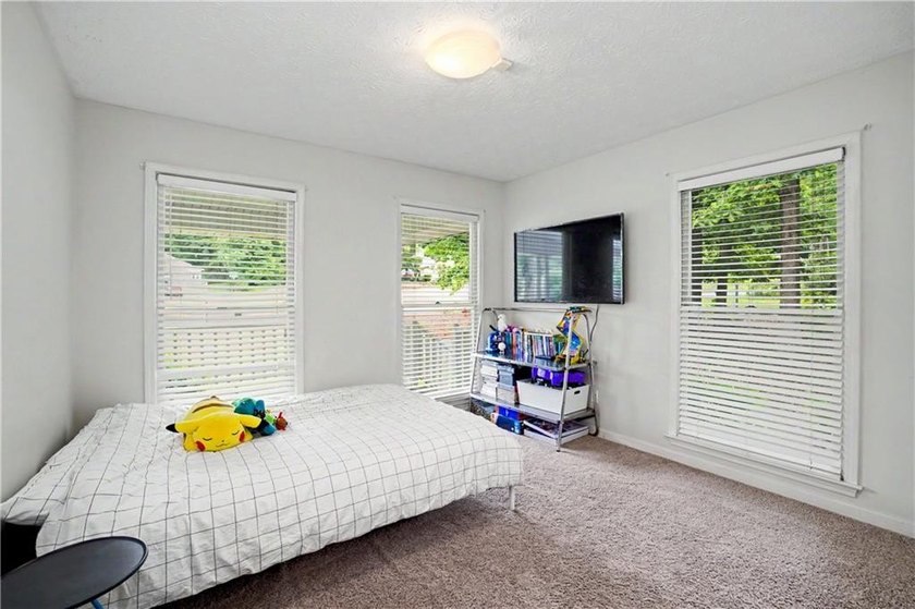 Welcome to this charming single-level home nestled in the - photo 27