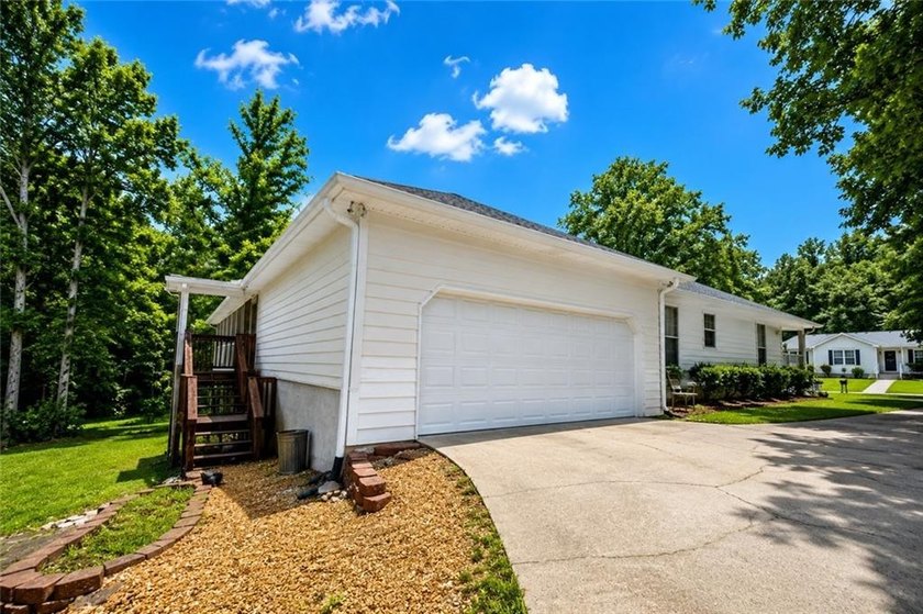 Welcome to this charming single-level home nestled in the - photo 34