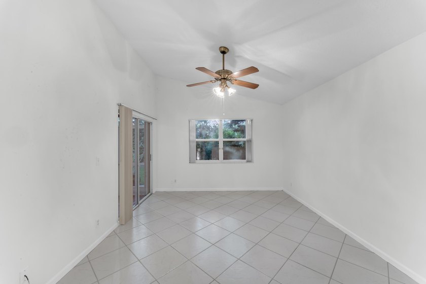 Move right into 3/2/2 in gated River Bridge. Newly painted, Roof - photo 13