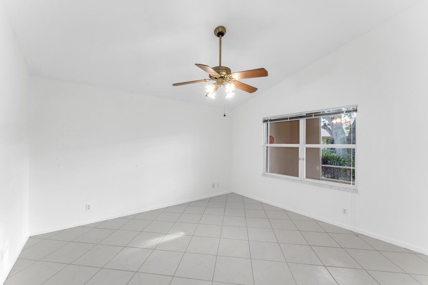 Move right into 3/2/2 in gated River Bridge. Newly painted, Roof - photo 15