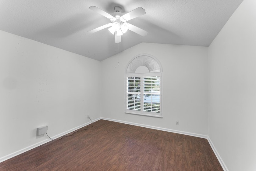 Move right into 3/2/2 in gated River Bridge. Newly painted, Roof - photo 20