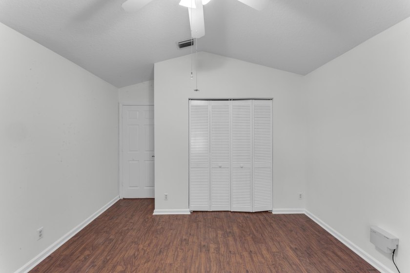Move right into 3/2/2 in gated River Bridge. Newly painted, Roof - photo 21