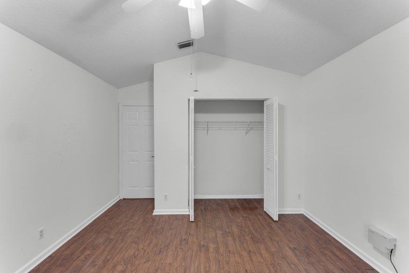 Move right into 3/2/2 in gated River Bridge. Newly painted, Roof - photo 22