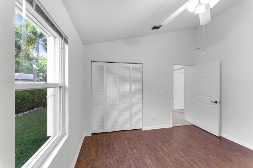 Move right into 3/2/2 in gated River Bridge. Newly painted, Roof - photo 27