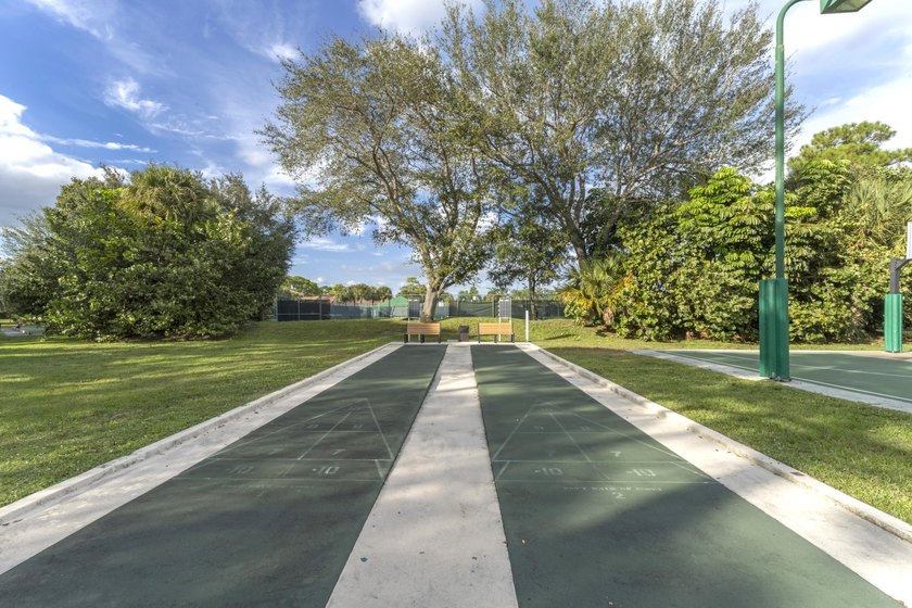Move right into 3/2/2 in gated River Bridge. Newly painted, Roof - photo 41