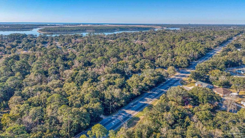 Prime development opportunity on 0.64 acres featuring four - photo 11