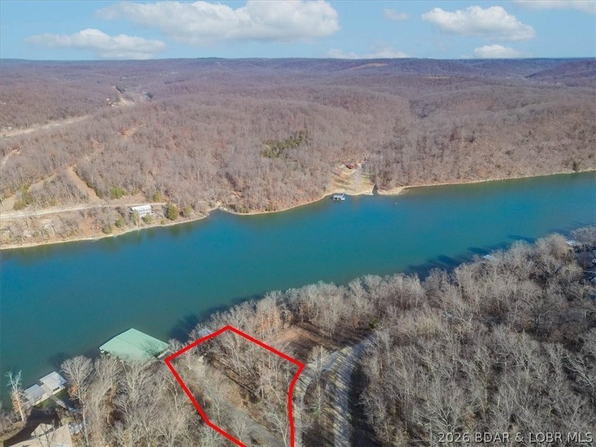 Prime 1.3-Acre Lakefront Canvas: Build Your Dream at Eagle Bay! - photo 12
