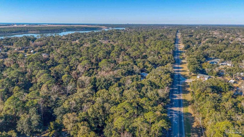 Prime development opportunity on 0.64 acres featuring four - photo 12