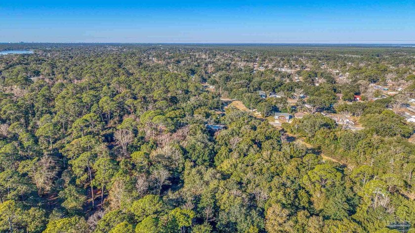 Prime development opportunity on 0.64 acres featuring four - photo 13