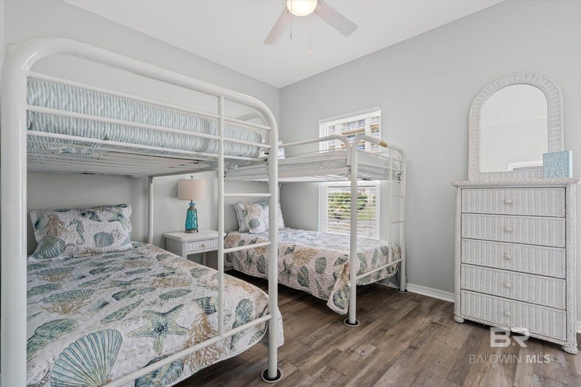 Panoramic Gulf views meet timeless coastal design. Poised within - photo 14