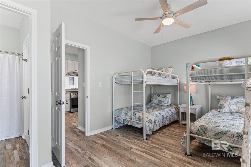 Panoramic Gulf views meet timeless coastal design. Poised within - photo 15