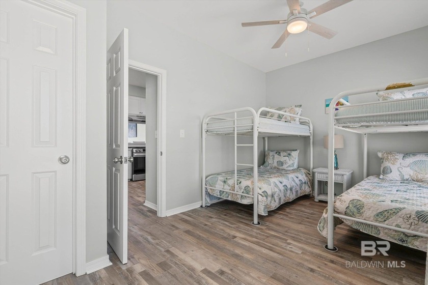 Panoramic Gulf views meet timeless coastal design. Poised within - photo 16