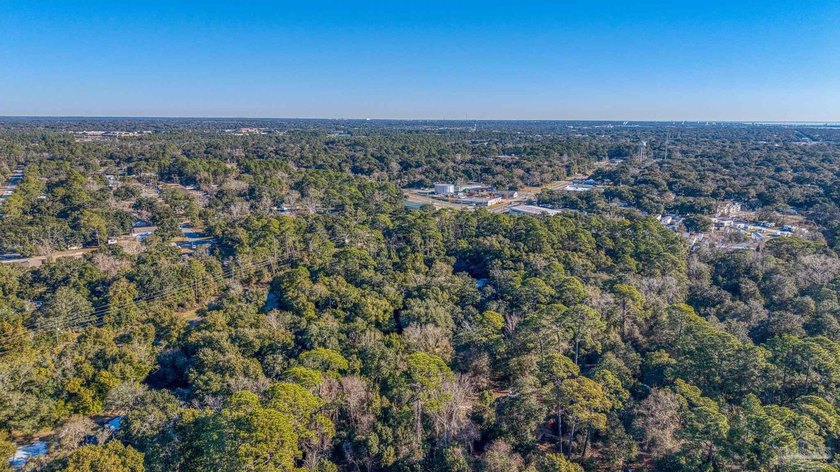 Prime development opportunity on 0.64 acres featuring four - photo 16