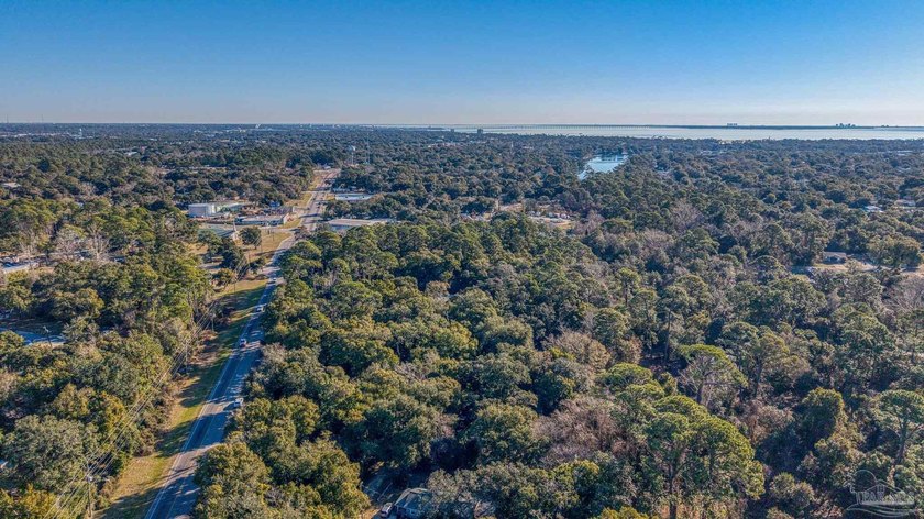 Prime development opportunity on 0.64 acres featuring four - photo 17