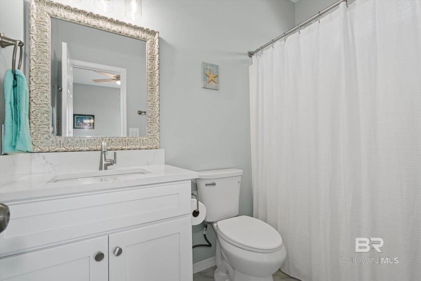 Panoramic Gulf views meet timeless coastal design. Poised within - photo 20