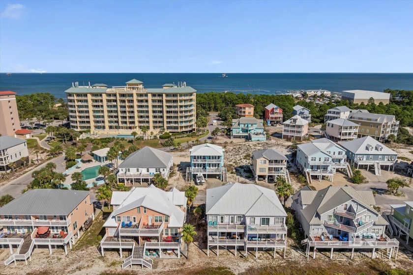Panoramic Gulf views meet timeless coastal design. Poised within - photo 52