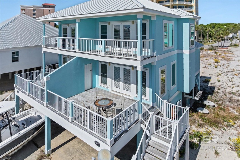 Panoramic Gulf views meet timeless coastal design. Poised within - photo 60