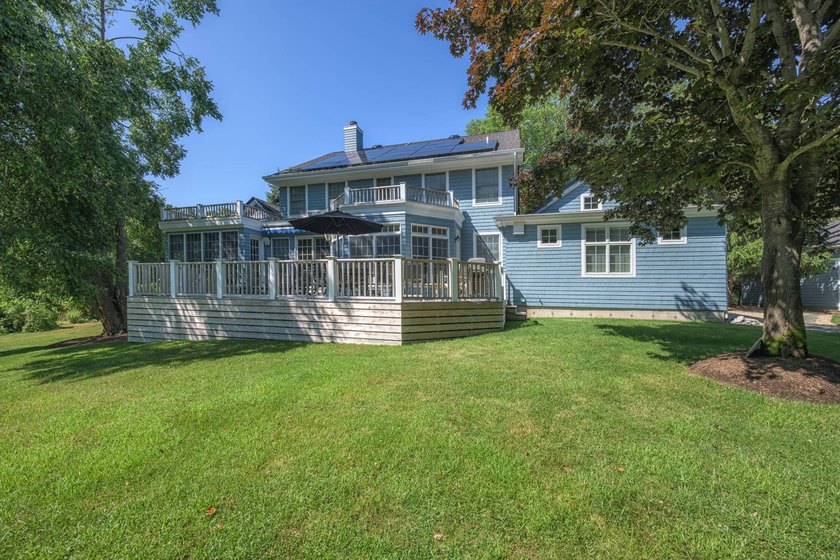 Set beside a 51-acre reserve and moments from the bay, this - photo 3