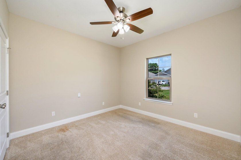 As you step inside, you are greeted with an open floor plan that - photo 24