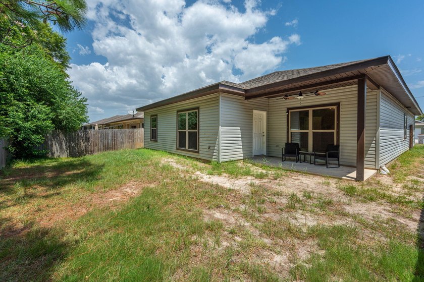 As you step inside, you are greeted with an open floor plan that - photo 35