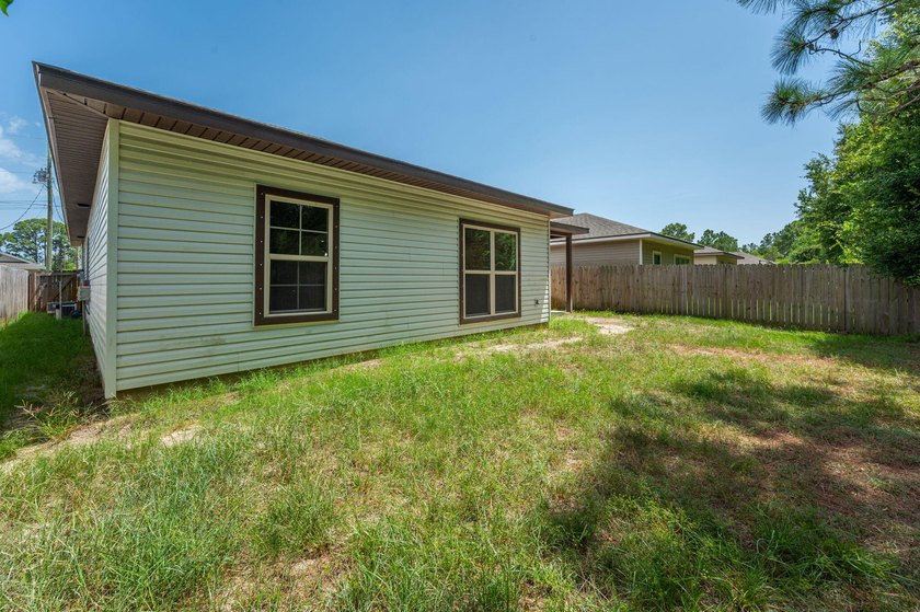 As you step inside, you are greeted with an open floor plan that - photo 36