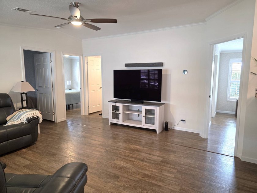 THIS HOME IS ON LEASED LAND WITH A MONTHLY LOT OF $494.47AND - photo 3