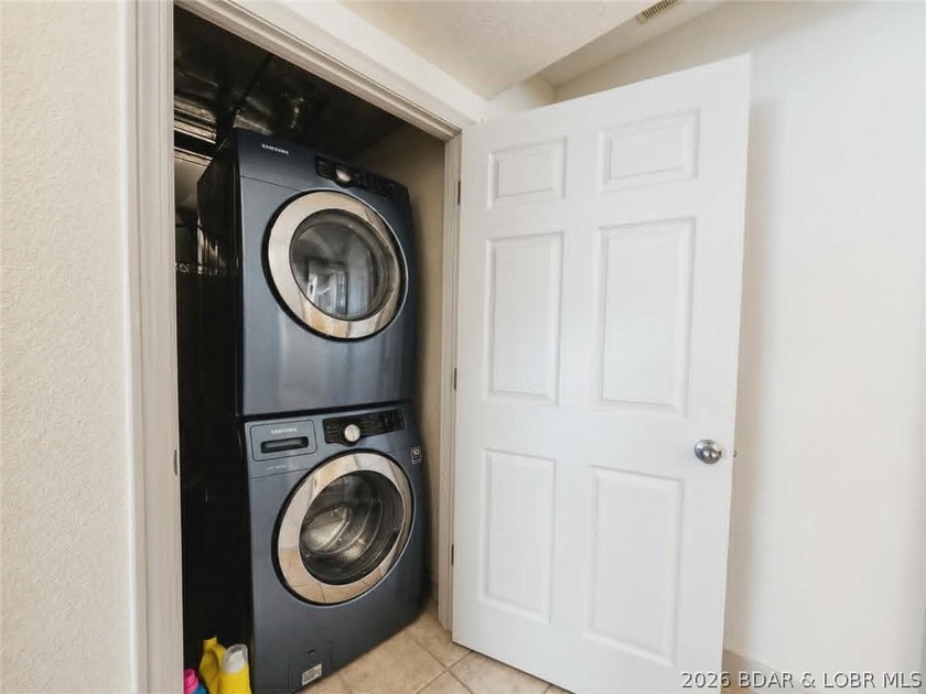 Step inside to vaulted ceilings and a stunning primary suite - photo 13