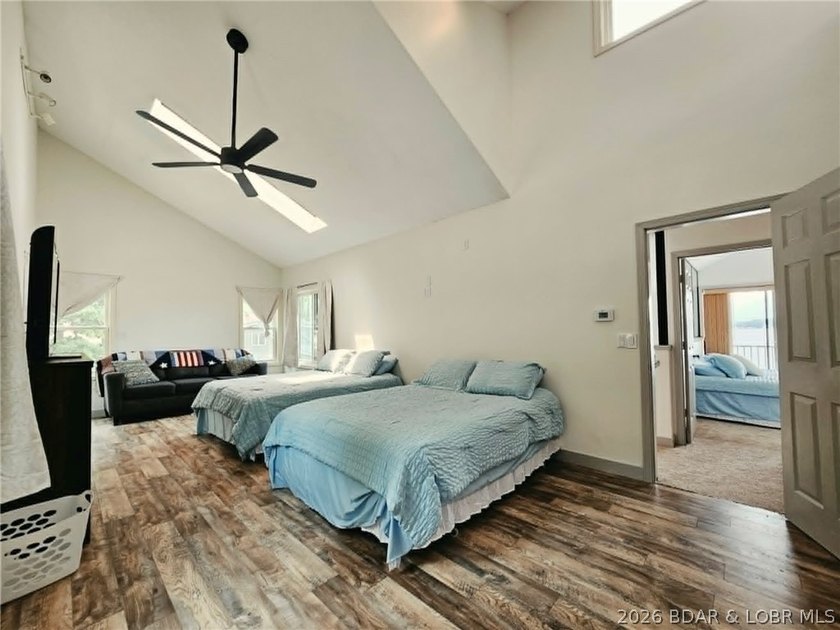 Step inside to vaulted ceilings and a stunning primary suite - photo 19