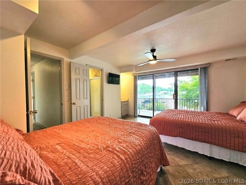 Step inside to vaulted ceilings and a stunning primary suite - photo 28
