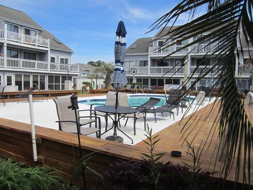 Step into your own coastal escape with this beautifully updated - photo 29