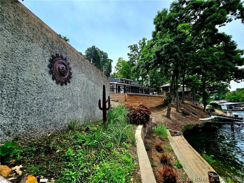 Step inside to vaulted ceilings and a stunning primary suite - photo 41