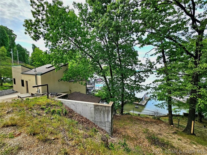 Step inside to vaulted ceilings and a stunning primary suite - photo 48