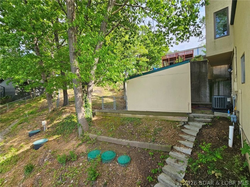 Step inside to vaulted ceilings and a stunning primary suite - photo 49