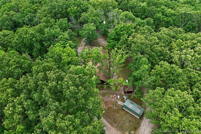GREAT VALUE! Beautiful home on 4.49+ wooded acres with deeded - photo 38