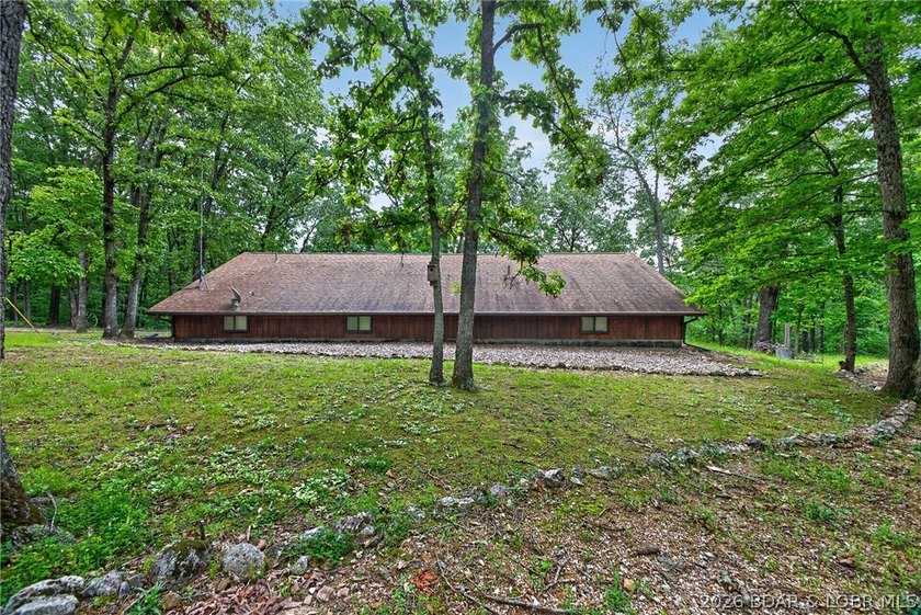 GREAT VALUE! Beautiful home on 4.49+ wooded acres with deeded - photo 48