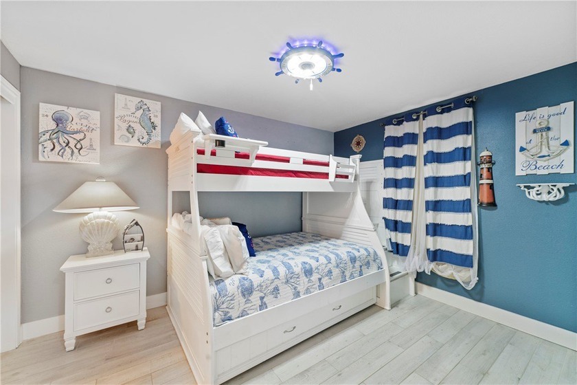 BEACHFRONT BEAUTY! Fabulously updated, this spacious 3-bedroom - photo 3