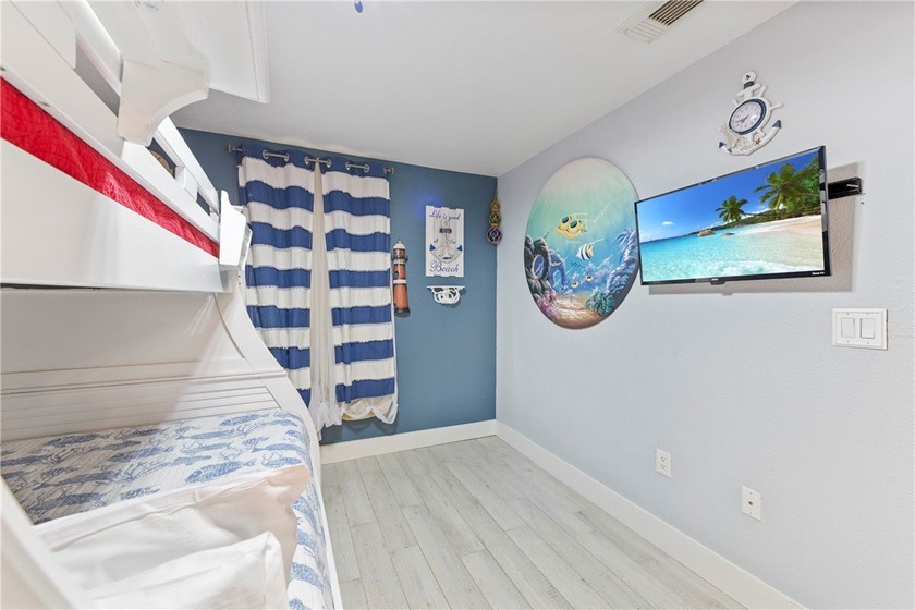BEACHFRONT BEAUTY! Fabulously updated, this spacious 3-bedroom - photo 4