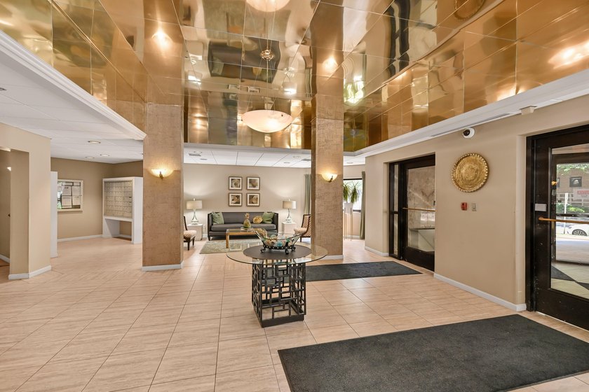 Experience elevated city living in this beautifully maintained - photo 2